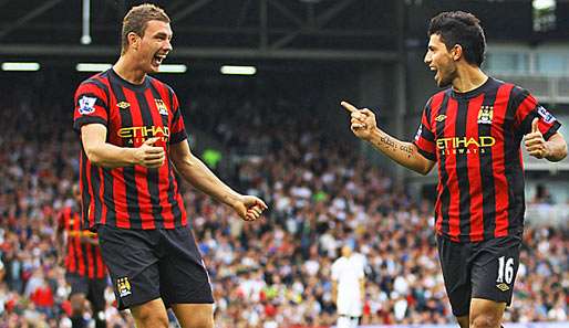 Edin Dzeko (l.) traf für Manchester City bei den Queens Park Rangers zum 1:1 