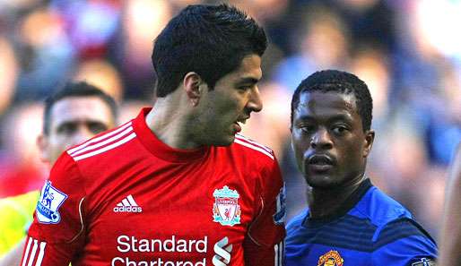 Luis Suarez (l.) hatte Patrice Evra (r.) mehrfach rassistisch beleidigt
