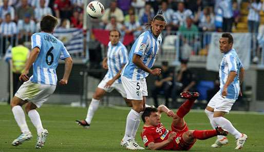 Martin Demichelis (M.) führte seinen FC Malaga auf den Weg in die Champions League