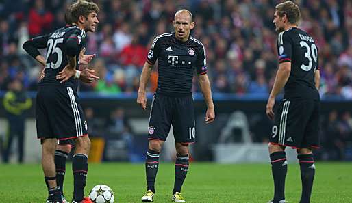 Ob mit Thomas Müller (l.) oder mit Toni Kroos (r.): Arjen Robben will vor allem immer spielen