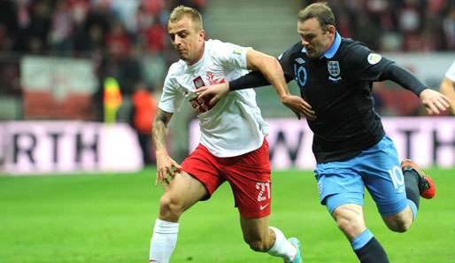 Wayne Rooney (r.) erzielte nach einer Ecke das glückliche 1:0 für die Three Lions