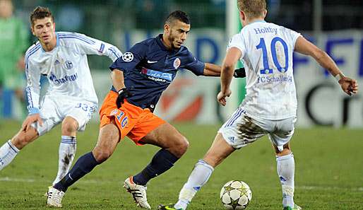 Vielleicht bald Teamkollegen bei den Spurs: Younes Belhanda (M.) und Lewis Holtby (r.)