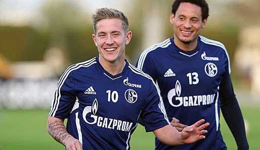 Lewis Holtby (l.) will mit Tottenham Hotspur um Titel spielen