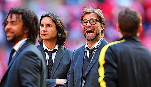 Jürgen Klopp (2.v.r.) bastelt mit Sportdirektor Michael Zorc am Kader von Borussia Dortmund