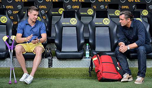 Lukasz Piszczek (l.) wird seine Krücken bald los sein und die Reha beginnen