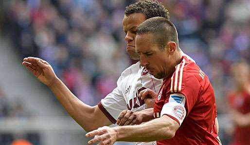 Timothy Chandler (l.) und der Club wollen den Bayern das Leben so schwer wie möglich machen