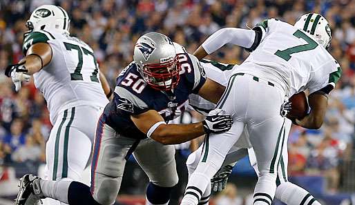 3 INTs, 4 Sacks: Jets-QB Smith (r.) hatte gegen die Pats-Defense um Ninkovich (M.) nichts zu lachen