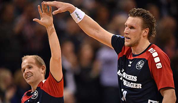 Andres Eggert (l.) und Lars Kaufmann (r.) bleiben mit der SG Flensburg-Handewitt weiter auf Kurs 