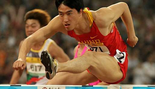 Chinas Leichtathletik-Star Liu Xiang zog sich in Peking eine hartnäckige Achillessehnen-Verletzung zu