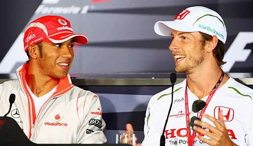 Konkurrenten in der Formel 1:  Lewis Hamilton (l.) und Jenson Button