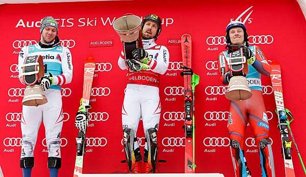 Marcel Hirscher feiert auf dem Podest seinen Siegg