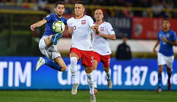 Piotr Zielinski (links) traf zur 1:0-Führung für die Polen in Italien.