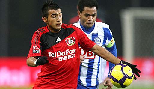 Artur Vidal und Raffael fighten um den Ball