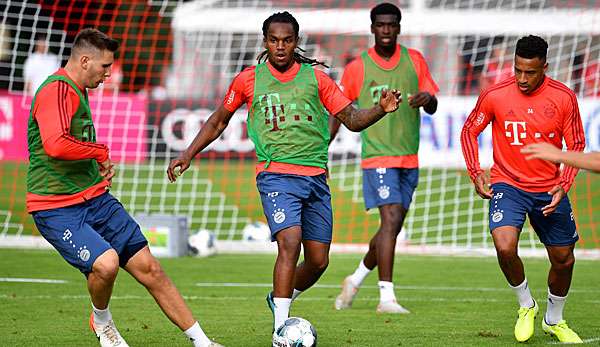 Niklas Süle (l.) im Mannschaftstraining mit Renato Sanches (M.).