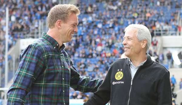 Leipzig-Trainer Julian Nagelsmann (l.) begrüßt Lucien Favre.