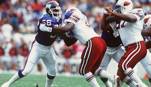 Lawrence Taylor (l.) gewann zwei Mal den Super Bowl