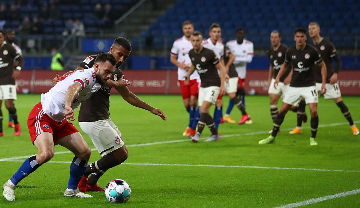 Nach den Siegen der Aufstiegsrivalen VfL Bochum und Holstein Kiel steht der Hamburger SV am Montag im 105. Stadtderby beim FC St. Pauli unter Erfolgszwang.