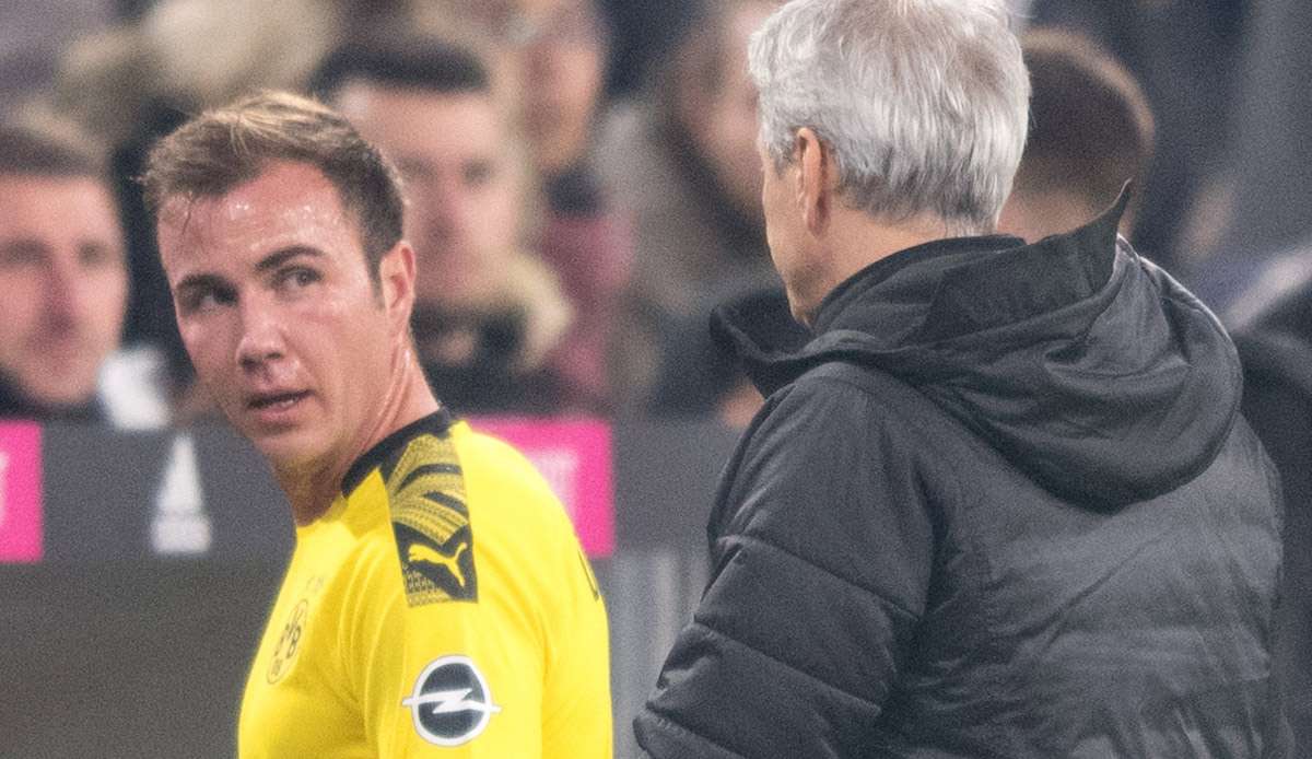 Mario Götze (l.) zusammen mit dem früheren BVB-Trainer Lucien Favre.