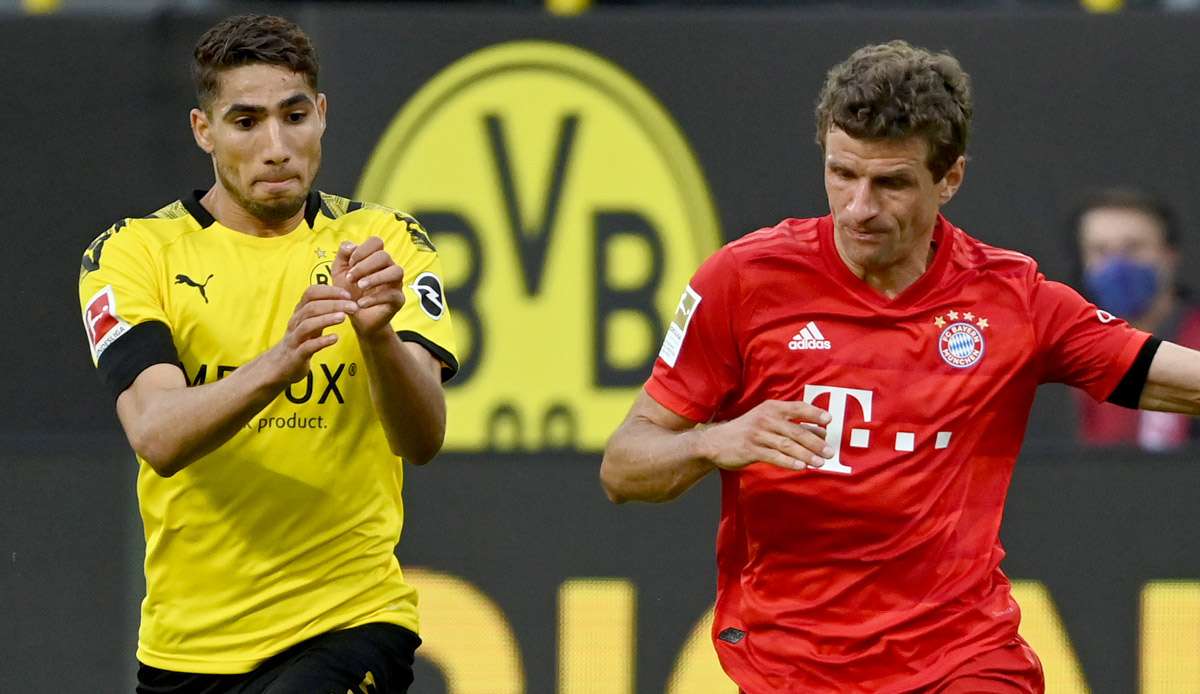 Achraf Hakimi im BVB-Trikot im Duell mit Thomas Müller.