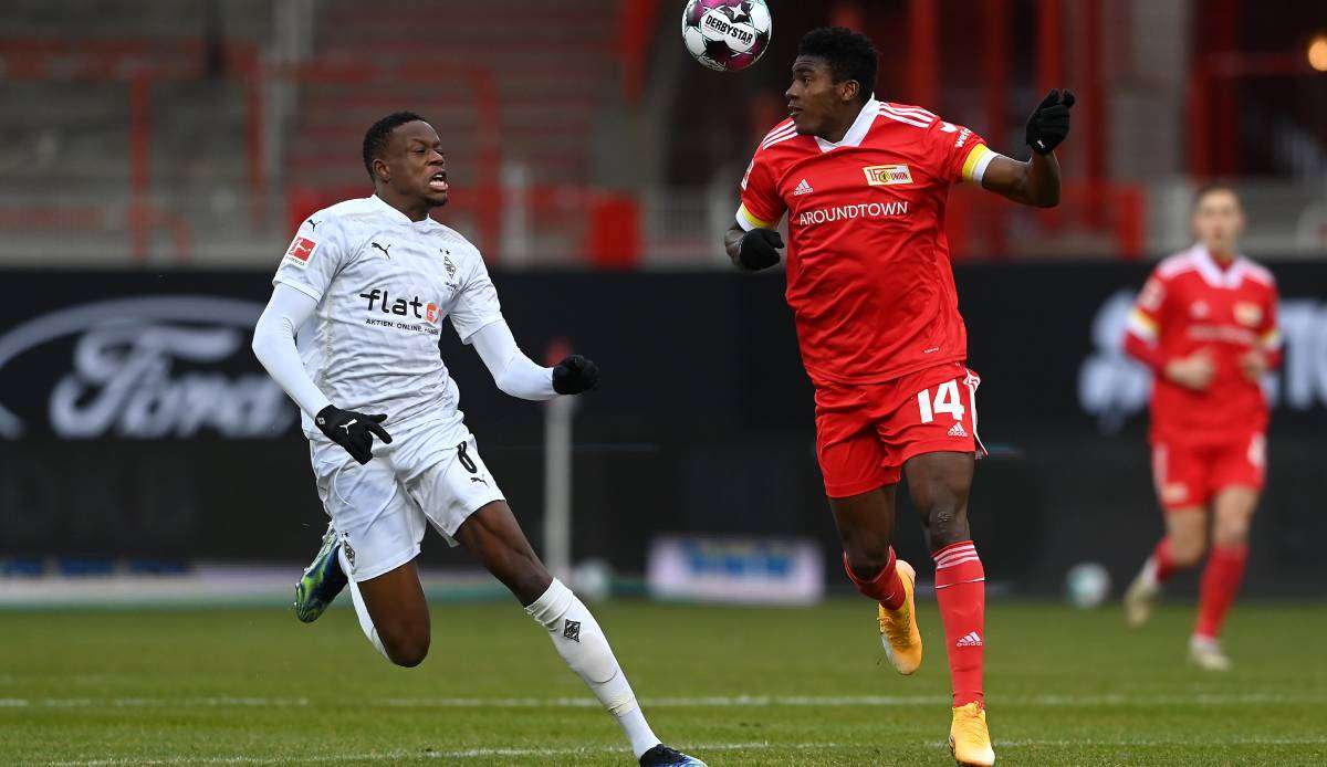 Union Berlin (r.: Taiwo Awoniyi) empfängt Borussia Mönchengladbach (l.: Denis Zakaria).