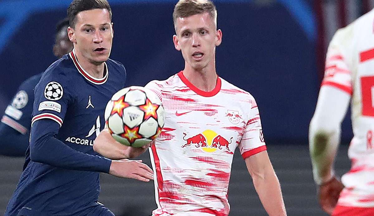 Szene aus der Champions League: Leipzigs Dani Olmo (r.) gegen Julian Draxler von Paris Saint-Germain.