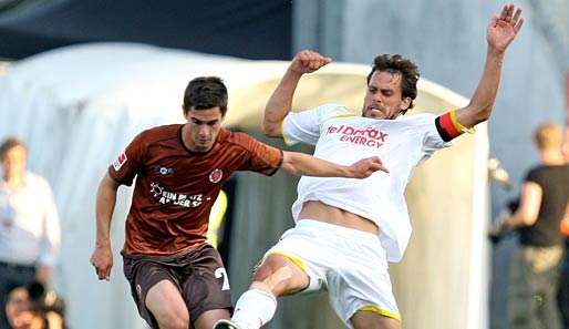 Fin Bartels (l.) kam 2010 ablösefrei von Hansa Rostock zum FC St. Pauli