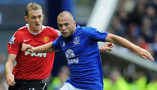 Johnny Heitinga (r.) lief bislang 62 Mal für die Nationalmannschaft der Niederlande auf