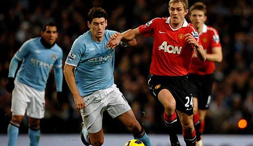 Machen Sie es heute besser? Darren Fletcher für United (r.), Gareth Barry für City