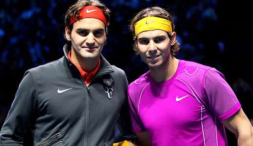 Roger Federer (l.) und Rafael Nadal helfen den Flutopfern in Australien