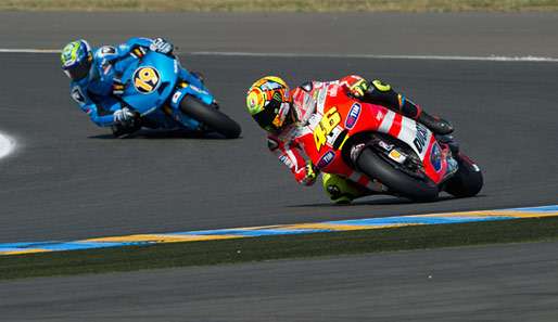 Valentino Rossi (r.) landete beim Großen Preis von Frankreich in Le Mans hinter Stoner und Dovizioso