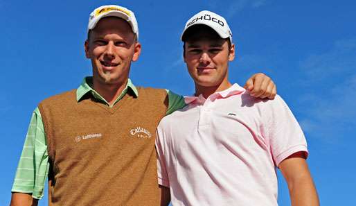 Martin Kaymer (r.) feierte einen gelungenen Auftakt in Schottland, Marcel Siem startete solide