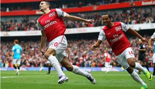 Auftakt nach Maß: Robin van Persie (l.) brachte Arsenal bereits nach 29 Sekunden in Führung